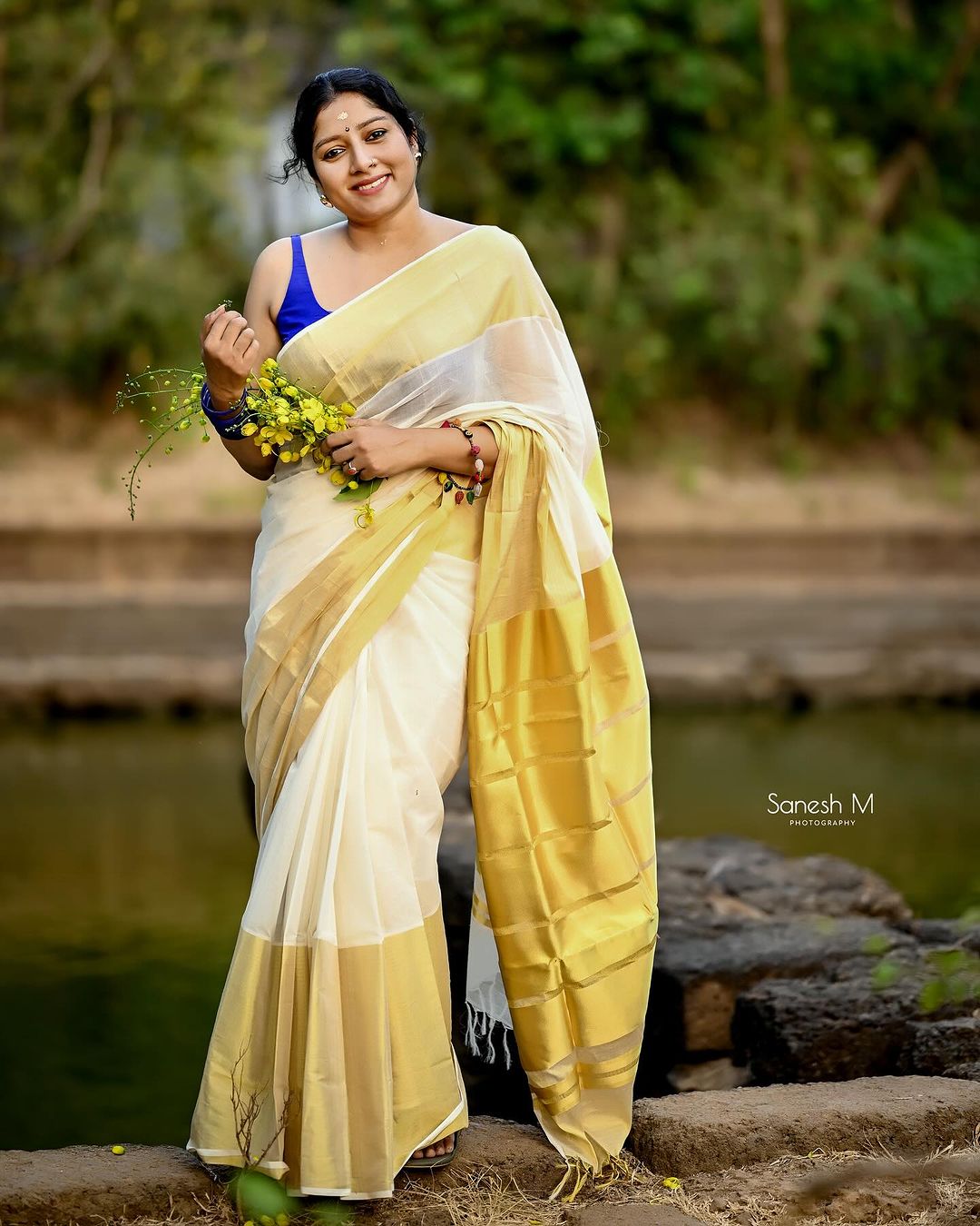 MALAYALAM ACTRESS ANUMOL STILLS IN WHITE SAREE